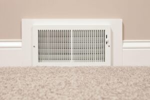 Forced-air HVAC vent in a finished basement